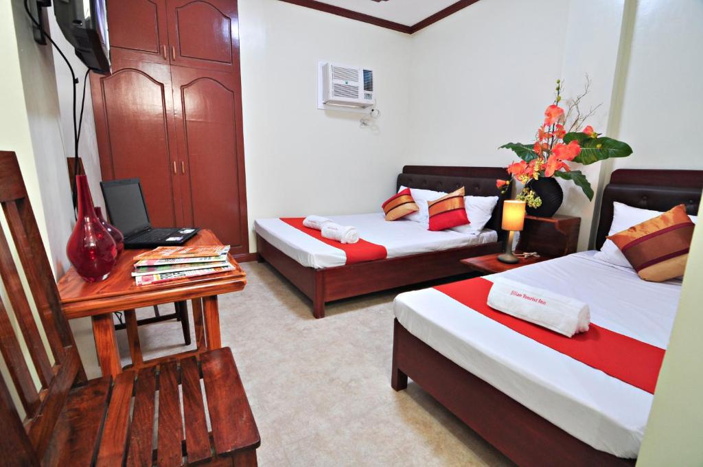 Jilian Tourist Inn Puerto Princesa Værelse billede